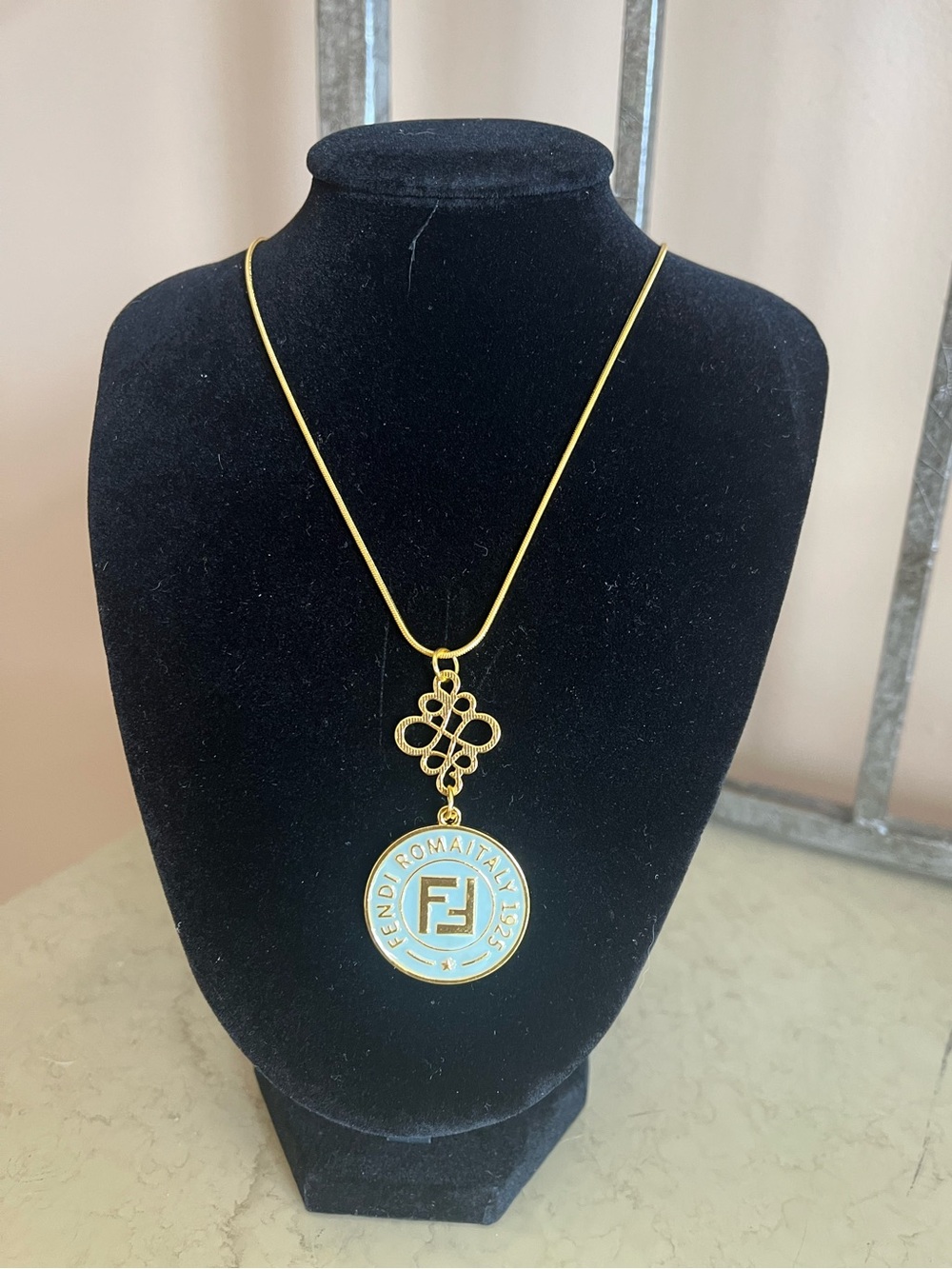Fendi Gold-Tone Pendant Necklace with Light Blue Enamel Disc 20” chain